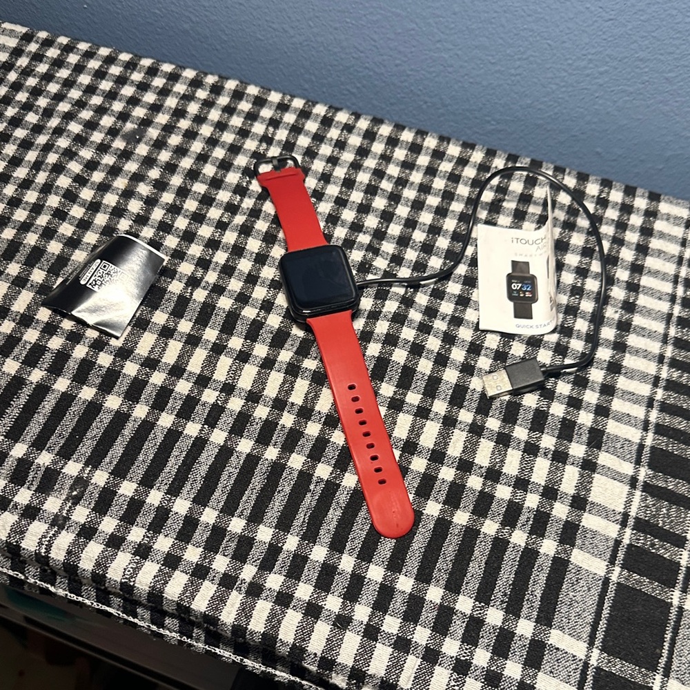 Smartwatch in Red itouch air 3 excellent condition.
